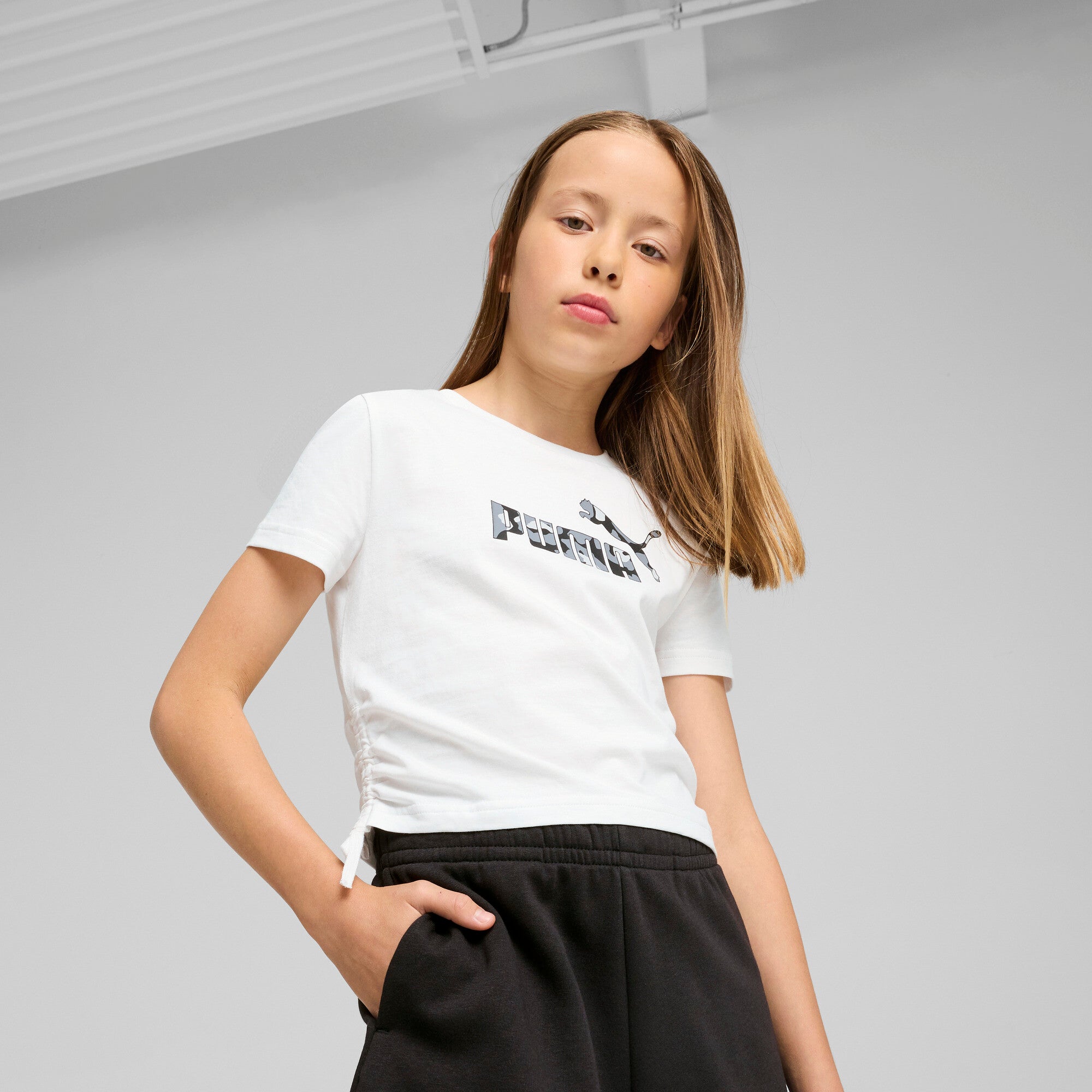 PUMA Essentials Animal Logo Infill Big Kids' Knotted T-Shirt in White, Size XL